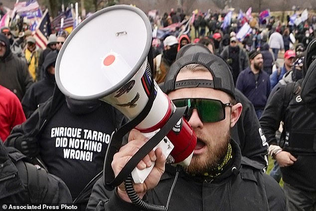 FILE - Proud Boy member Ethan Nordean walks to the US Capitol in Washington, in support of President Donald Trump on January 6, 2021. (AP Photo/Carolyn Kaster, File)