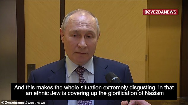 An unhinged Vladimir Putin (pictured) has claimed the West deliberately installed a Jewish Ukrainian leader to cover up its glorification of Nazism