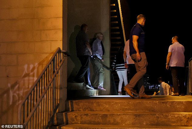 President Joe Biden and first lady Jill Biden with their Secret Service details