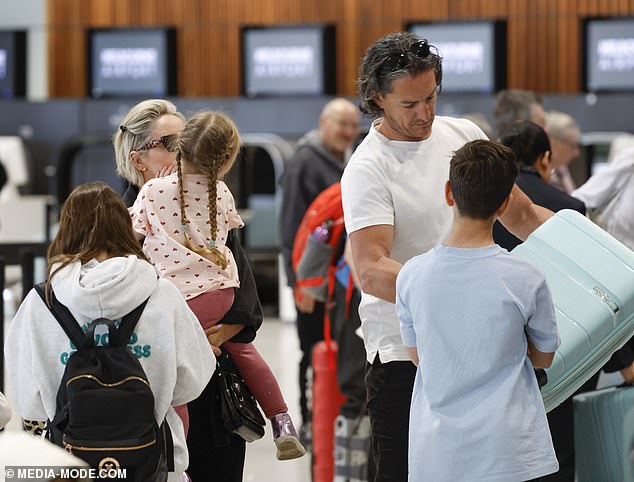 Rocky proved to be a gentleman when he helped Fifi and their blended family carry some of the heavier luggage