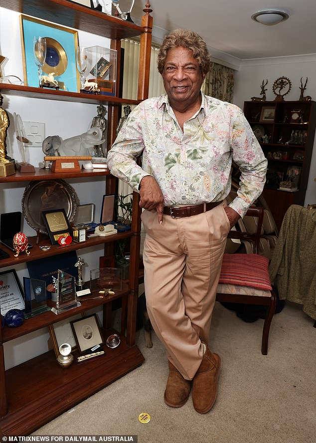 Singer Kamahl (above, on Monday), with a Yes campaign button jokingly thrown to the ground, explained that a series of texts and phone calls on Saturday and Sunday had convinced him to return to the No vote.