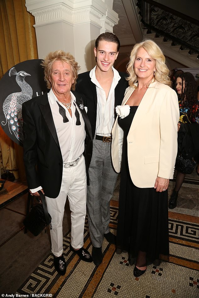 Family affair: Rod Stewart, 78, looked dapper alongside his glamorous wife Penny Lancaster, 52, and son Alastair, 17, as the family attended the House of Toby event on Friday