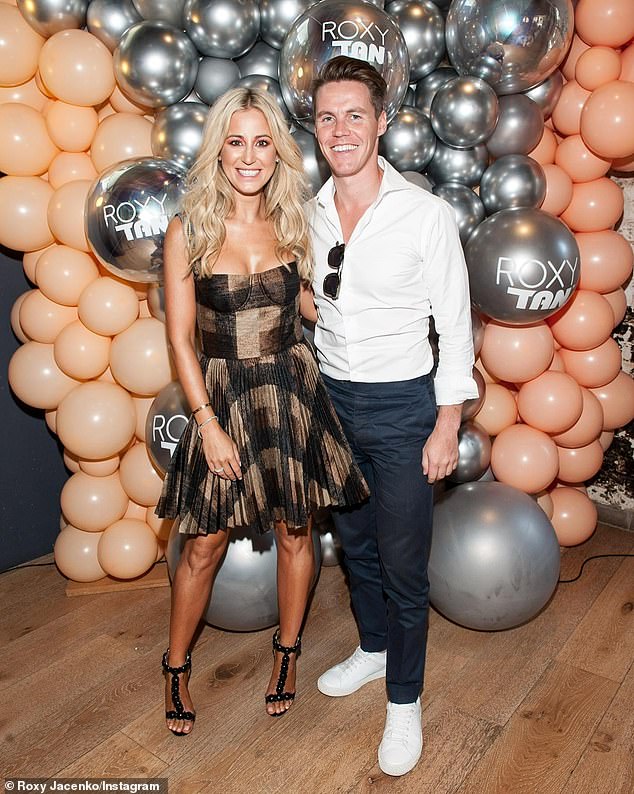 Jacenko recently secured a four-bedroom apartment in Singapore's exclusive Ardmore Residence, with a rumored price tag of $45,000 per month.  Pictured with husband Oliver Curtis