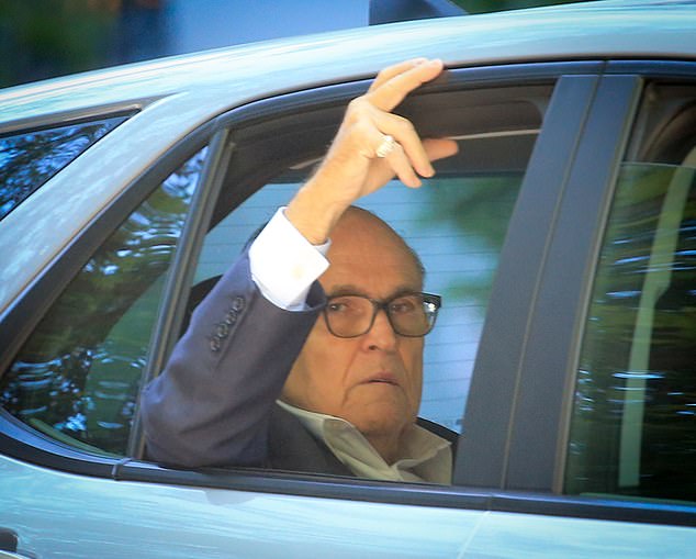 Rudy Giuliani was spotted leaving his apartment and hopping into a taxi to a business address in downtown Manhattan on Thursday