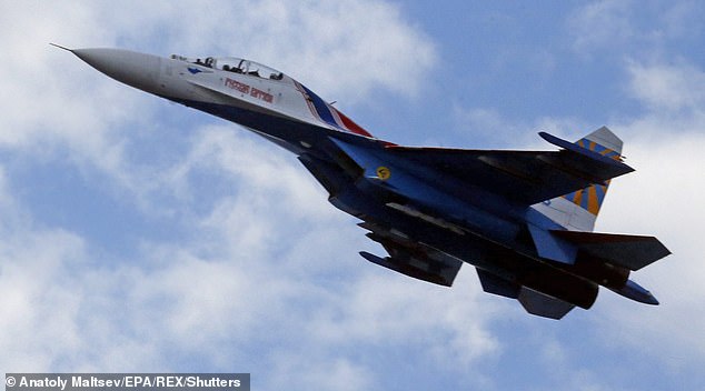 The pilot of the SU-27 fighter jet (file image) fired two missiles at the British military aircraft, with the first missing the target rather than malfunctioning as claimed by Russia at the time.