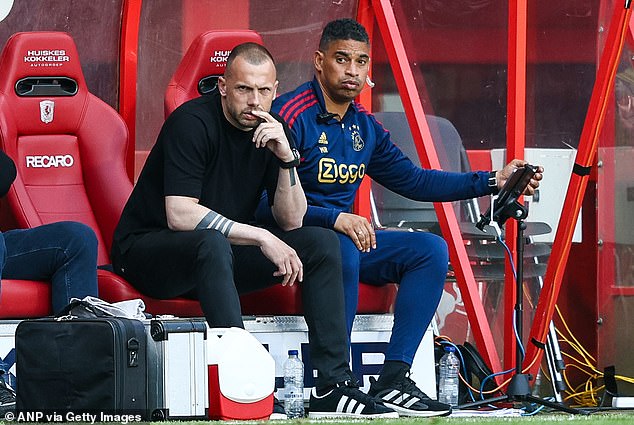 U21 assistant manager Michael Reiziger (right) said the call-up is not 'optional'