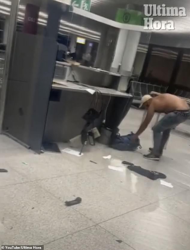 The aggressive man had taken off his T-shirt in his anger before he started throwing furniture at airport staff