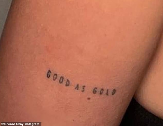 As good as gold!  She captioned the post: 'Swipe for my new tattoo'