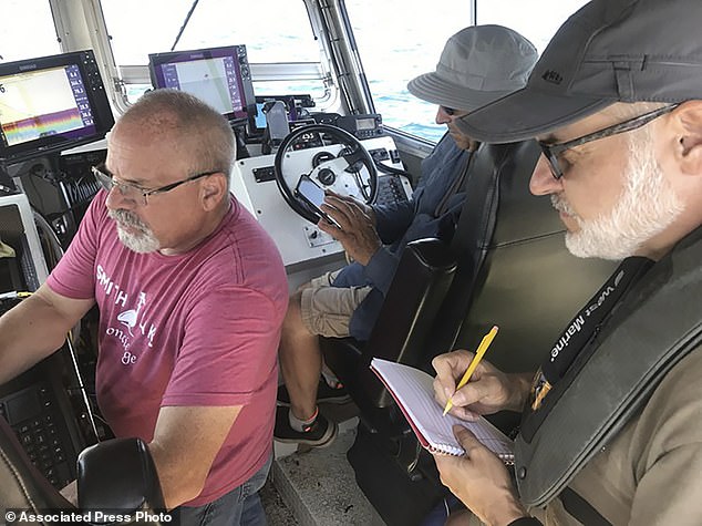 The ship was found by shipwreck hunters Brendon Baillod and Bob Jaeck, seen here charting the Trinidad off the coast of Algoma.  They found the 156-year-old ship in July at a depth of about 270 feet.