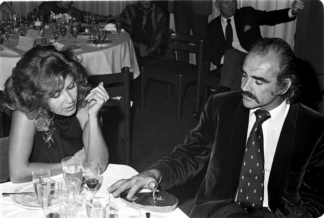 Sean Connery at the golf restaurant of 'La Manga del Mar Menor' with his wife Micheline Roquebrune, 1973, Murcia, Spain