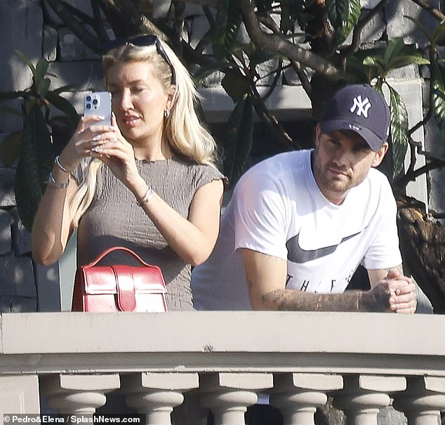 Liam Payne was rushed to hospital after suffering agonizing kidney pain during a romantic holiday with his girlfriend (pictured in Lake Como with Kate on Saturday)