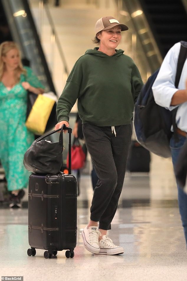 Happy: Shannen Doherty was spotted arriving at LAX after attending a '90s con in Tampa, Florida