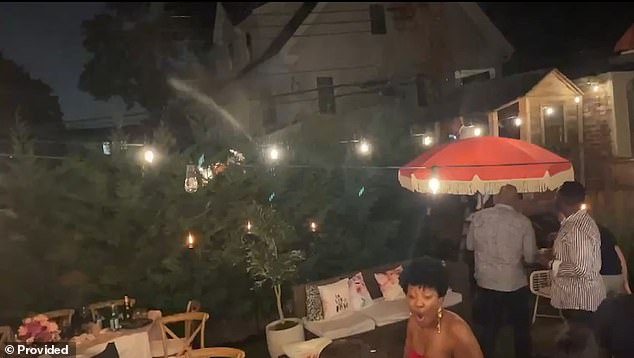 This is the shocking moment black partygoers ran for cover when a white neighbor sprayed them with a hose during a surprise birthday dinner hosted by a prominent New York City doctor