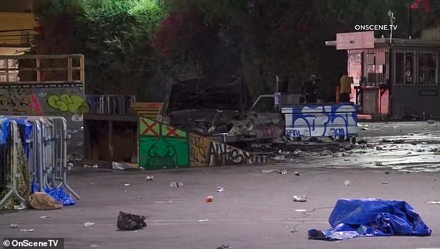 Graffiti covered the scene and even a Los Angeles Fire Department vehicle was destroyed