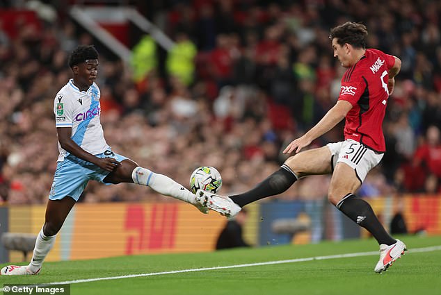 Harry Maguire (right) netted in his first start of the season for United