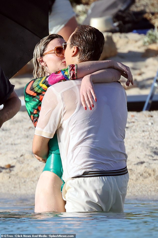 Romping around: Swimsuit-clad Sophie Turner, 27, was pictured passionately kissing her co-star Frank Dillane while filming ITV drama Joan in Spain