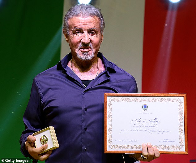 Congratulations: Sylvester Stallone was beaming from ear to ear on Wednesday.  The Rocky actor received honorary citizenship from the city of Gioia del Colle in Italy