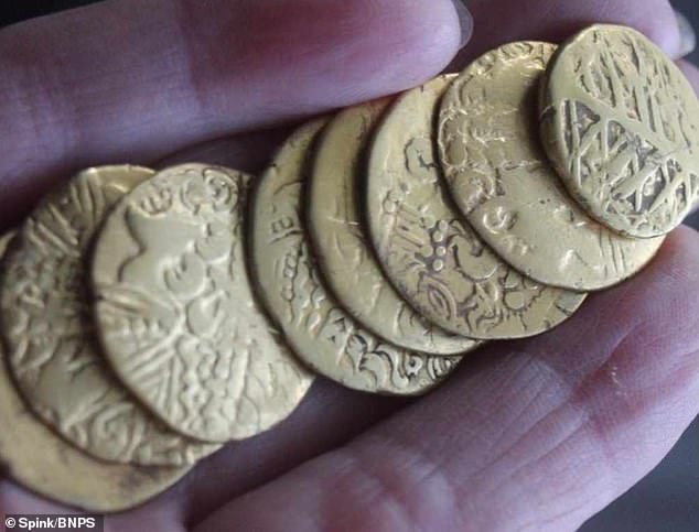 A metal detectorist has discovered Britain's oldest hoard of gold coins, dating back 2,173 years