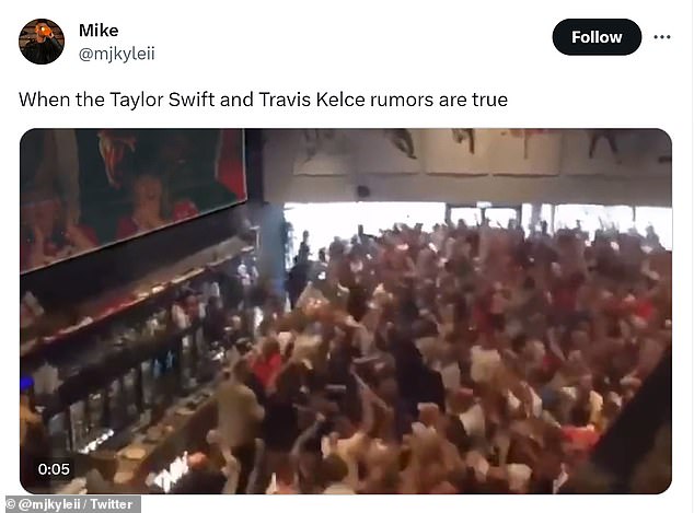 Finally!  In one humorous meme, a rapt audience sat in a bar watching a big screen TV.  As soon as Taylor appeared on screen from her stadium box, the crowd erupted in cheers