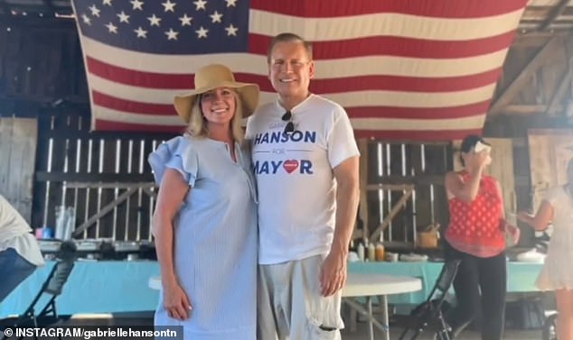 Gabrielle Hanson, pictured here with her husband Tom, a real estate agent, has pledged to 'defend our traditional values' and voted against licensing an LGBTQ+ pride event in Franklin