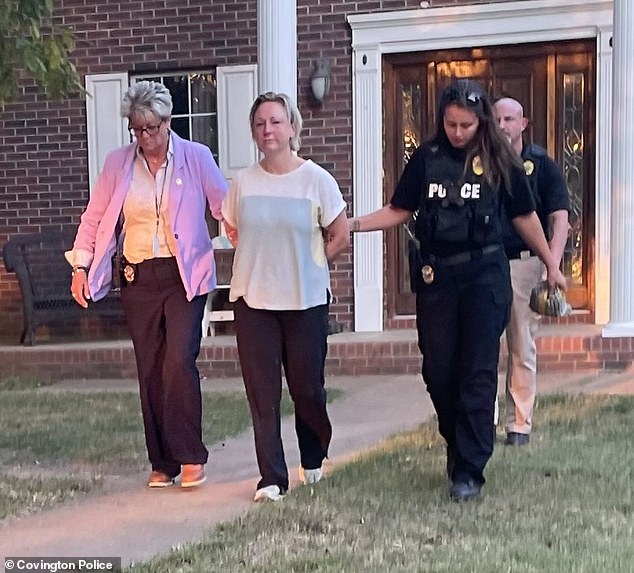 A former Tennessee elementary school teacher was arrested AGAIN after contacting the victim she allegedly raped using an unlisted phone number.  Alissa McCommon is seen being frog-marched from her home in Covington, Tennessee on Thursday