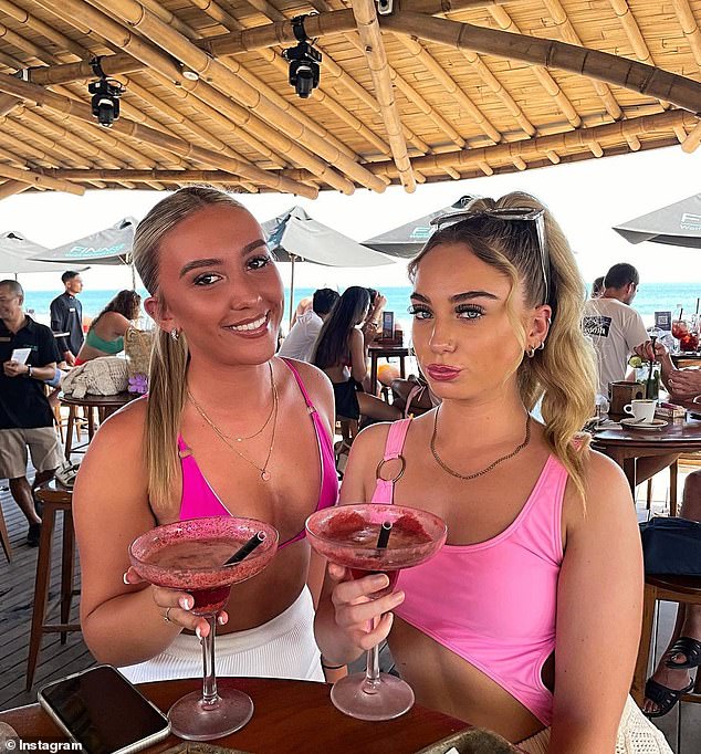 A Victorian family's near miss with Bali's motorcycle bandits has led to a warning for wearing expensive jewelery while on holiday there.  Pictured: Stock photo of two women enjoying a drink in Bali