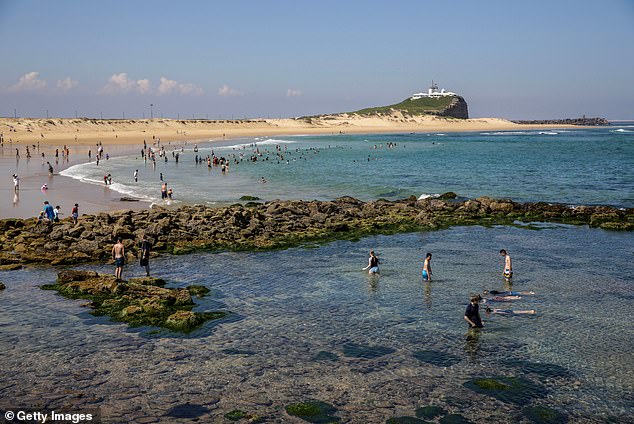 At the other end of the scale, Newcastle had the most loyal employees, with 20.5 percent having worked for the same employer for ten years or more (pictured are swimmers at Nobbys Beach)