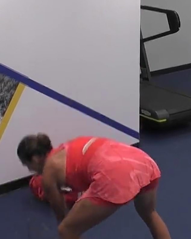 Sabalenka can be seen slamming her racket into the ground after returning to the locker room