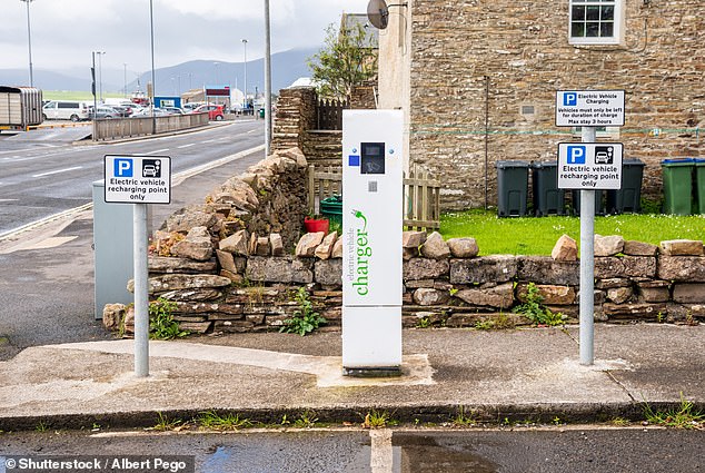 Despite only having a population of 22,000, electric car owners already have access to 15 public fast chargers on the inhabited islands, according to data from the Department for Transport (pictured, one of two charging points in the Ferry Road car park on the Orkney -Islands)