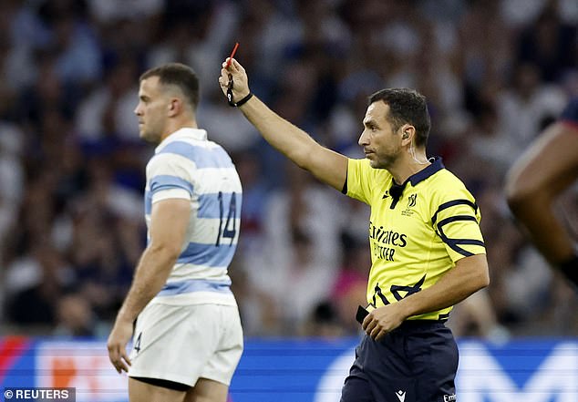 Referee Mathieu Raynal carries his trusty whistle and notebook, but eagle-eyed fans have noticed he and his colleagues are not wearing timepieces during the Cup