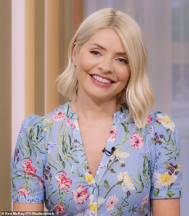 Holly Willoughby (pictured in July) returns to the This Morning bank today after her eight-week summer break in a bid to salvage it after the Phillip Schofield scandal that cast doubt on its future