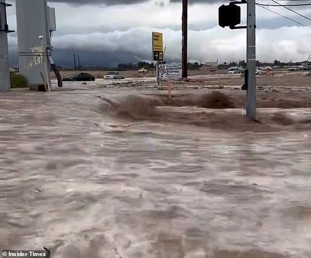 The National Weather Service warned the public not to attempt to cross flooded roads as residents and visitors try to cope