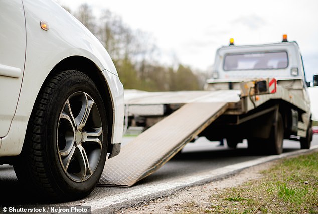 A 'predatory' tow truck driver was charged with assaulting a 21-year-old woman while out on bail for assaulting a teenager three months earlier