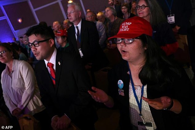 People pray and sing during a conservative Christian 'Pray Vote Stand' summit in Washington on September 15, 2023