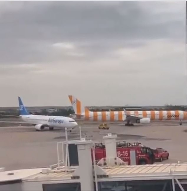 Two holiday planes collided on the tarmac of Palma airport in Mallorca this morning.  In the photo: the scene