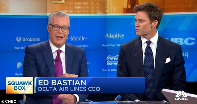 Delta CEO Ed Bastian (left) with new brand ambassador Tom Brady, who some blame for the changes