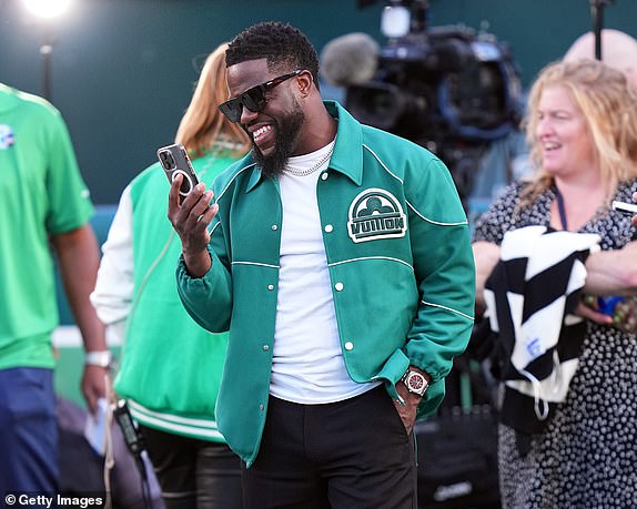 PHILADELPHIA, PENNSYLVANIA – SEPTEMBER 14: Actor and comedian Kevin Hart stands on the sidelines for the game between the Minnesota Vikings and the Philadelphia Eagles at Lincoln Financial Field on September 14, 2023 in Philadelphia, Pennsylvania.  (Photo by Mitchell Leff/Getty Images)