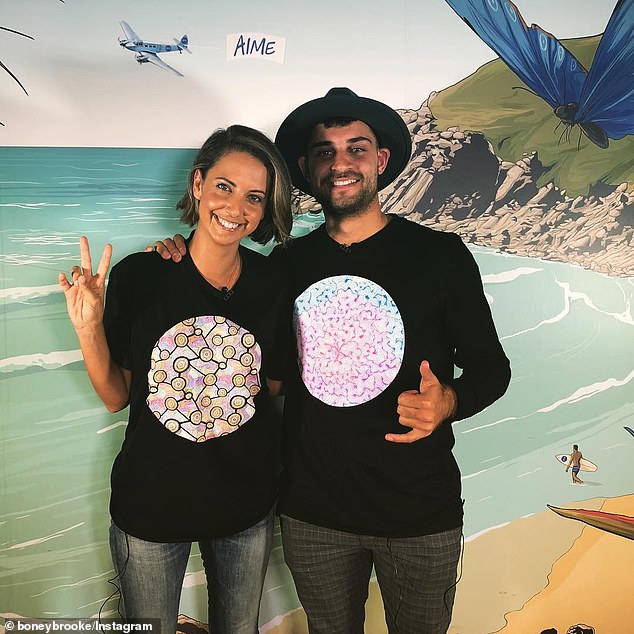 Ben Abbatangelo, a proud Gunaikurnai and Wotjobaluk man and former Melbourne Stars cricketer, says 'slow incremental changes are killing us'.  Pictured: Brooke Boney, who plans to vote Yes, with Mr. Abbatangelo, who plans to vote No