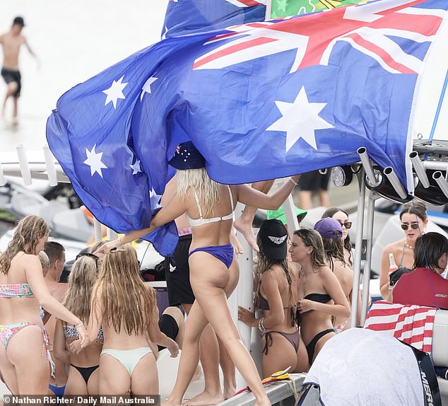 A prominent Indigenous leader campaigning against the Voice to Parliament has broken ranks with most others on the No side by calling for Australia Day to be moved to January 26.  Beachgoers are pictured celebrating Australia Day on the Gold Coast in 2022