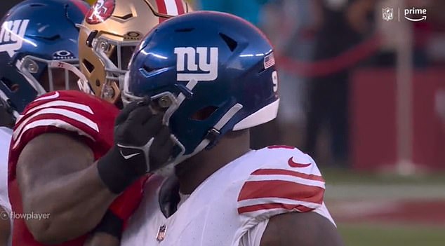 Trent Williams (left) hit A'Shawn Robinson (right) after a QB knee just before halftime