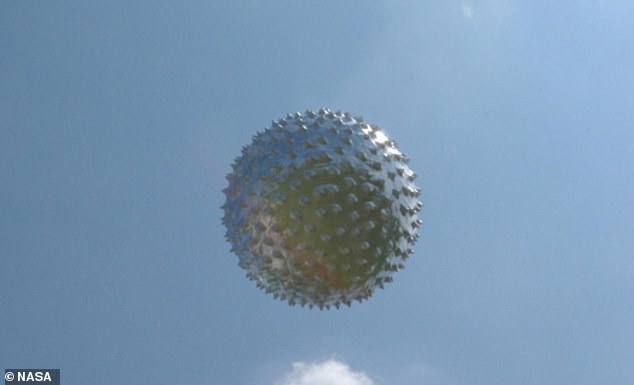 Above, a weather balloon floats through the sky after being released from the Cape Canaveral weather station in Florida.  NASA's panel included this image in their report as an example of the striking, highly unusual objects that nevertheless have an Earth-like explanation