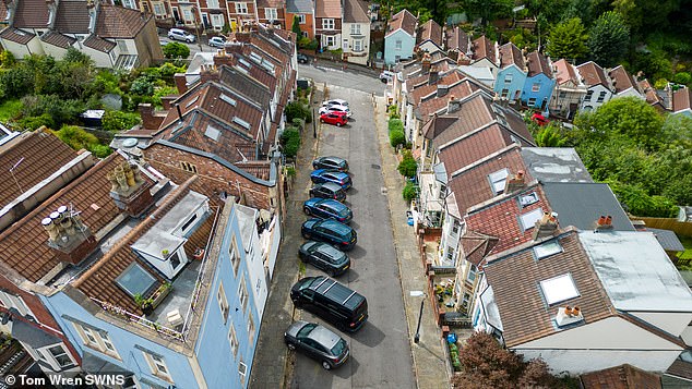 Vale Street, Bristol, is the steepest street in England with a slope of 22 degrees.  Delivery and collection drivers refuse to take to the road as cars park sideways for fear they will roll down