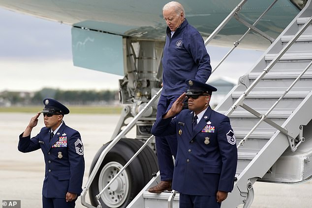 President Biden slipped and caught himself before falling as he used the small staircase to leave Air Force One in Michigan