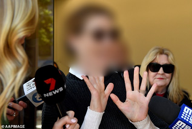 William Tyrrell's foster mother (centre) - who cannot be identified for legal reasons - stood in court on Tuesday alongside the missing boy's foster father