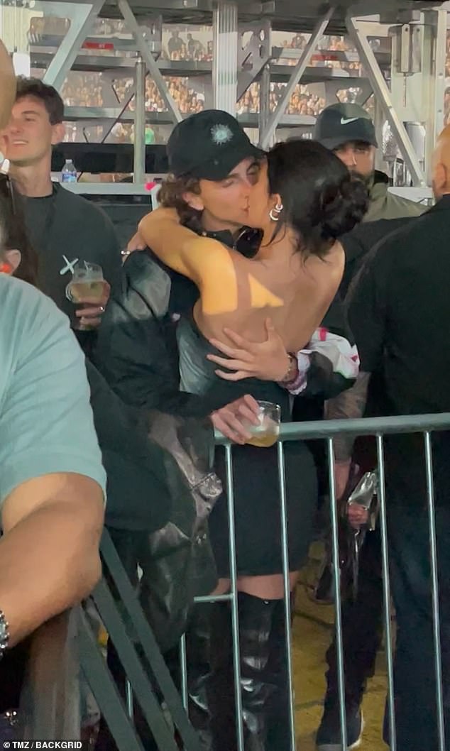 Smooch: The couple weren't shy about showing their affection for each other when they finally made their romance public on Monday at Beyoncé's concert in LA