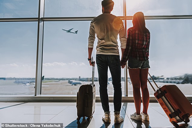 An unnamed man, 47, from the Pacific Northwest has sparked a fierce debate on Reddit after boarding a plane without his wife and leaving her alone at an airport (Photo: stock photo of a couple before departure)