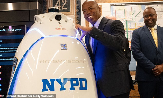 The robot, a product of Knightscope, the developer of autonomous security robots, has four cameras that it can use to record video without sound and moves at a speed of 5 km/h (pictured today at the Times Square subway station)