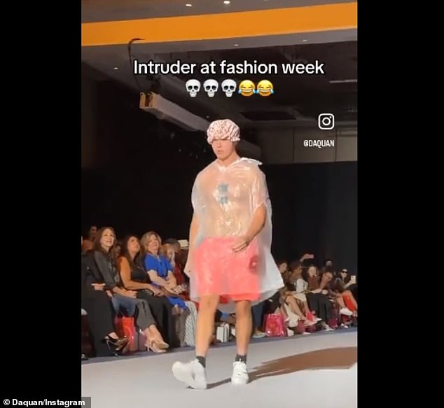 Fred Beyer, 21, wore a clear trash bag, shower cap and bright pink shorts as he confidently walked down the ramp