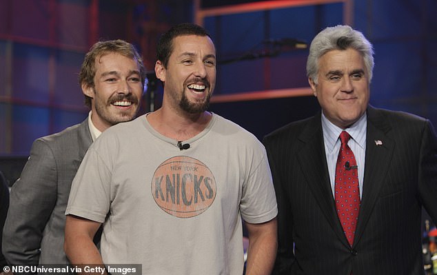 The band performed the first single Straight Lines from their 2007 album Young Modern on the popular talk show to promote it to an American audience.  Pictured: Johns with Adam Sandler (center) and Jay Leno (right)