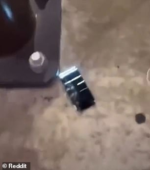 A damaged iPhone on the ground that was recorded and shared on social media